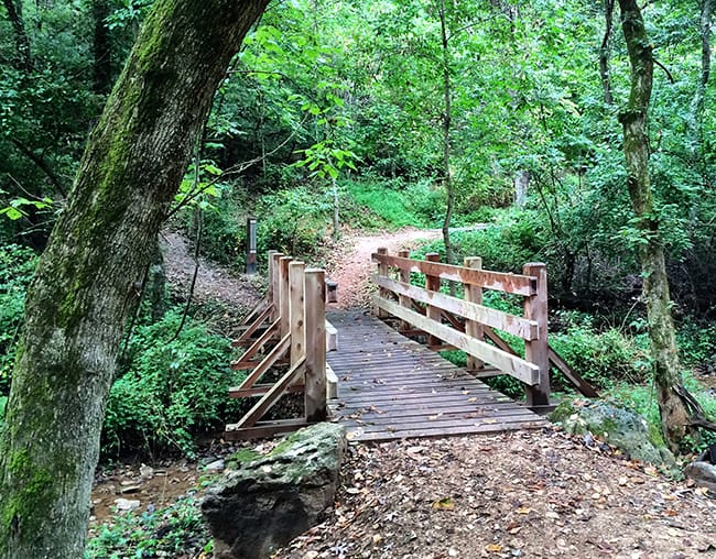 bridge-and-dirt-trail-along-lake-atalanta-paved-trail