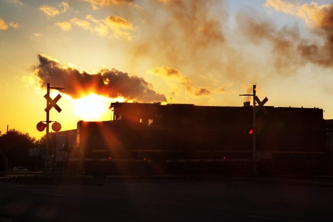 Train Crossing at Sunrise